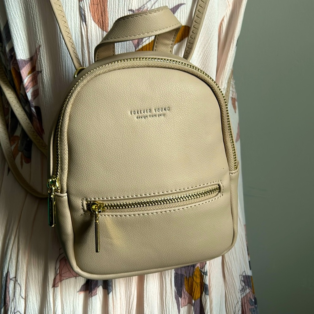 Forever Young Design From Poly Mini Backpack Cros… - image 1